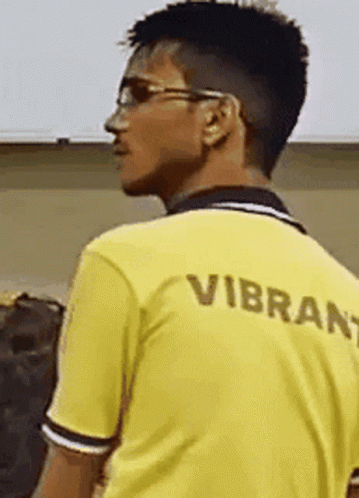 Man In Yellow Shirt Saying Vibrant GIF