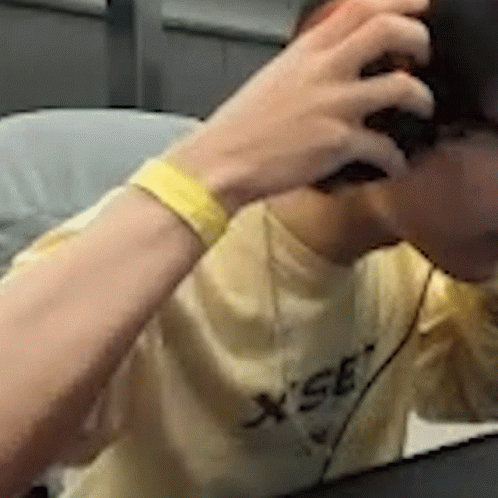 Man in Yellow Shirt Saying X Se