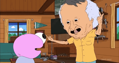 Man in Yellow Shirt Talking to Cartoon Character