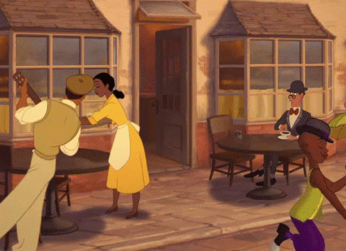 Man In Yellow Shirt Talking To Woman In Black Top GIF