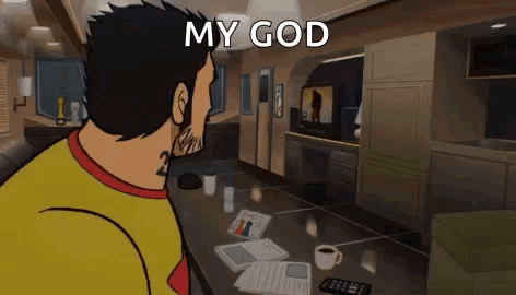 Man in Yellow Shirt Watching TV