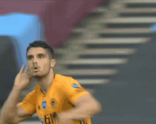 Man in Yellow Shirt with Allianz Badge