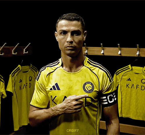 Man in Yellow Shirt With Kaed