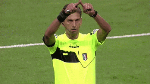Man In Yellow Shirt With Letter I GIF