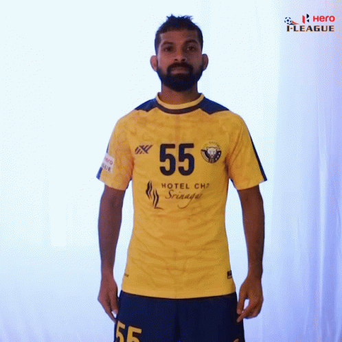 Man in Yellow Shirt with Number 55