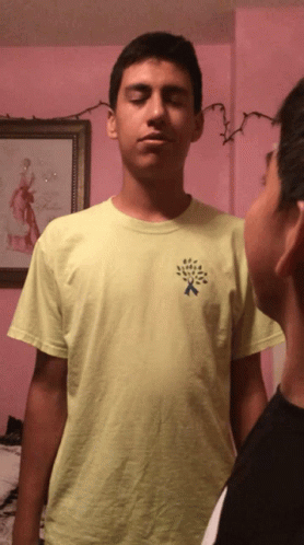Man In Yellow Shirt With Tree GIF