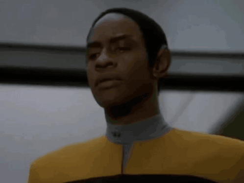 Man in Yellow Suit and Black Hat