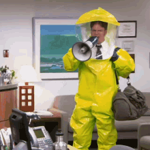 Man in Yellow Suit Holding Megaphone