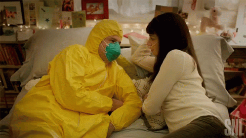 Man in Yellow Suit Lying on Bed