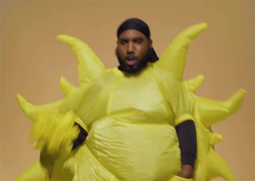 Man in Yellow Sun Costume Smiling