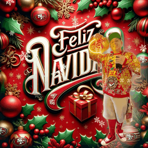 Man in Yellow Sweater With Feliz Navidad Card
