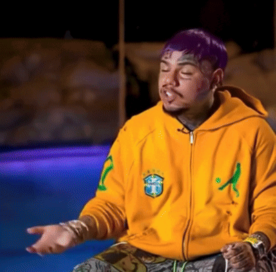 Man in Yellow Sweatshirt with Letter T
