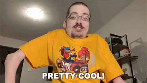 Man in Yellow T-Shirt Saying Pretty Cool