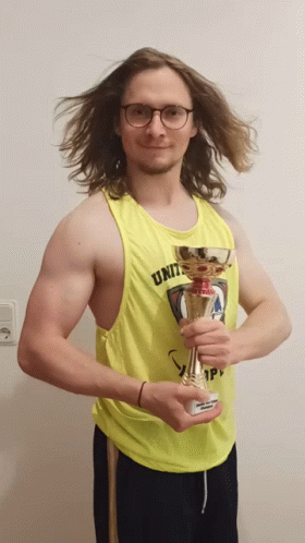 Man In Yellow Tank Top Holding Trophy GIF