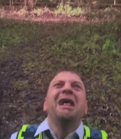 Man in Yellow Vest and Tie Yelling
