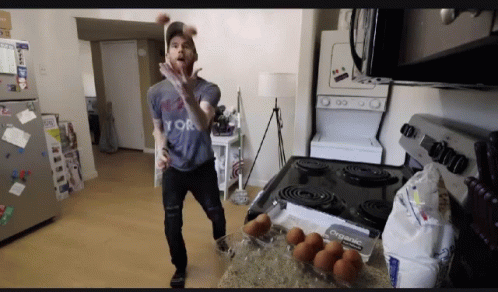 Man in York Shirt Throwing Eggs