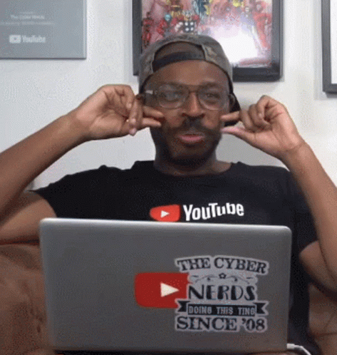 Man In YouTube Shirt At Laptop GIF