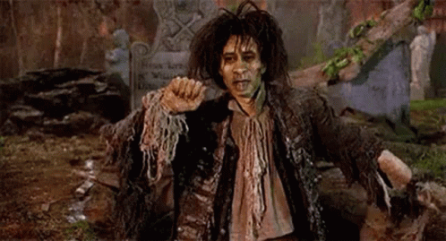 Man in Zombie Costume in Cemetery