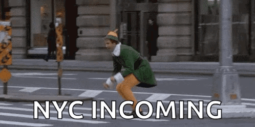 Man Jumping Crosswalk In Green Elf Costume GIF