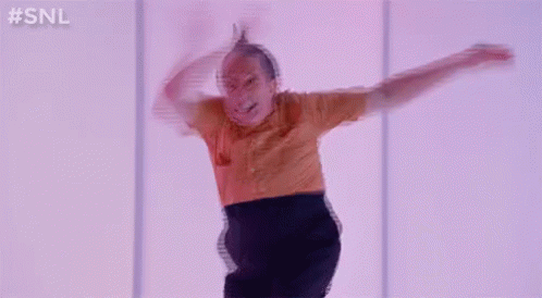 Man Jumping In Yellow Shirt And Black Skirt GIF