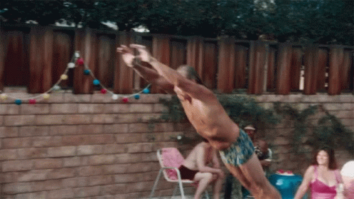 Man Jumping Into Pool
