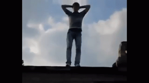 Man Jumping Of Building Russian Dance GIF
