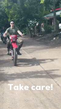 Man Jumping Over Rock Holding Rope