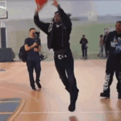 Man Jumping with Basketball
