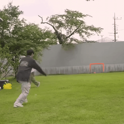 Man Kicking Ball In Abercrombie Sweatshirt GIF