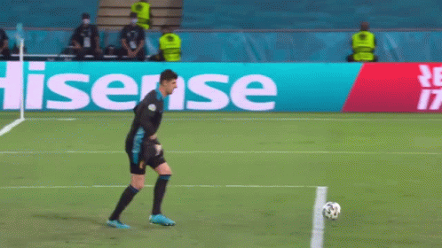 Man Kicking Soccer Ball by Hisense Sign
