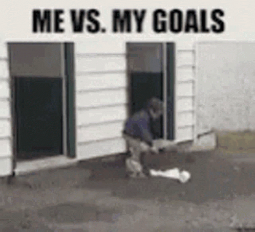 Man Kicking Soccer Ball In Front Of Building Saying Me Vs. My Goals GIF