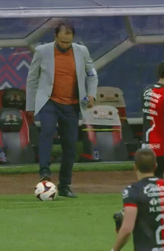 Man Kicking Soccer Ball