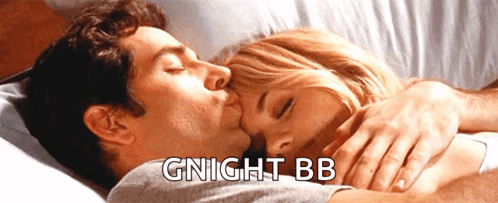 Man Kissing Woman In Bed Gnight BB GIF
