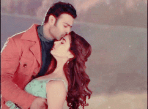 Man Kissing Woman On Forehead GIF