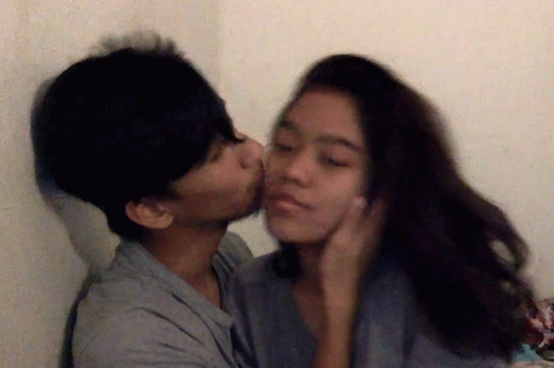 Man Kissing Woman On Forehead GIF