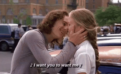 Man Kissing Woman on Forehead Saying I Want You to Want Me