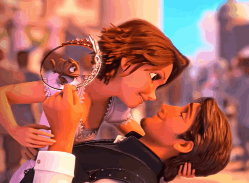 Man Kissing Woman With Tiara GIF