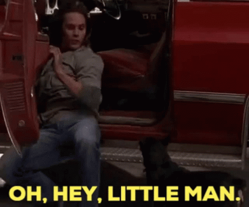Man Kneeling at Red Car Says Oh Hey Little Man