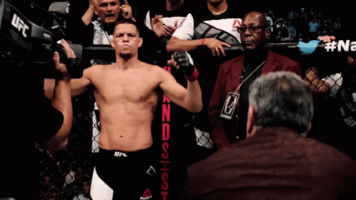 Man Kneeling in Boxing Ring