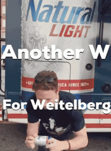 Man Kneeling In Front Of Natural Light Can GIF