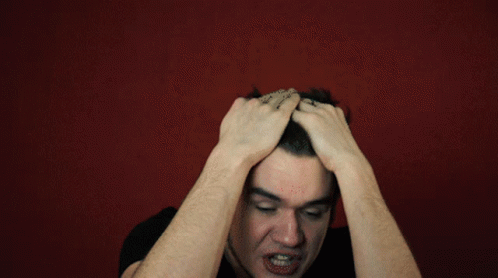 Man Kneeling Please Stand By Red Letters GIF