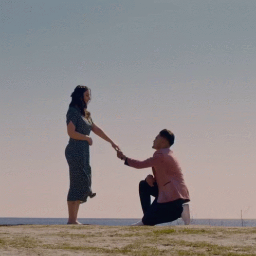 Man Kneeling Proposing To Woman GIF