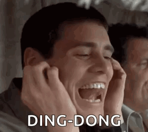 Man Laughing Covering Ears Looking in Mirror