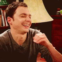 Man Laughing Eyes Closed By Lamp GIF