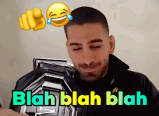 Man Laughing Holding Plaque Saying Blah