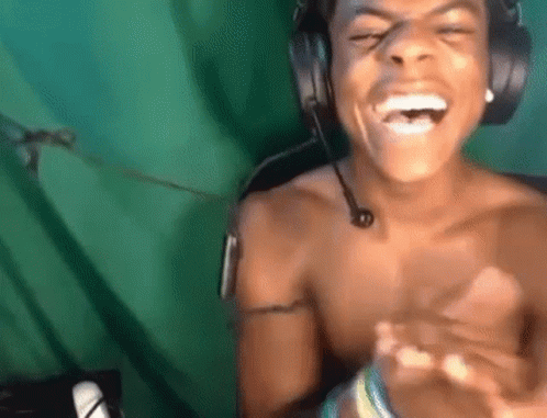 Man Laughing Shirtless With Headphones GIF