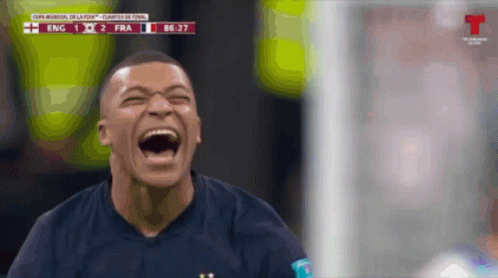 Man Laughing Watching Soccer Game Score 2 to 1