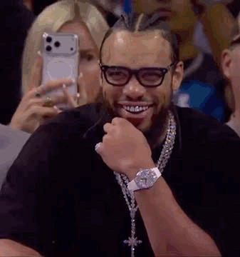 Man Laughing with Glasses and Watch