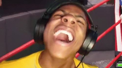 Man Laughing With Headphones And Tongue Out GIF