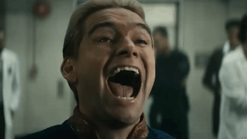 Man Laughing with Others